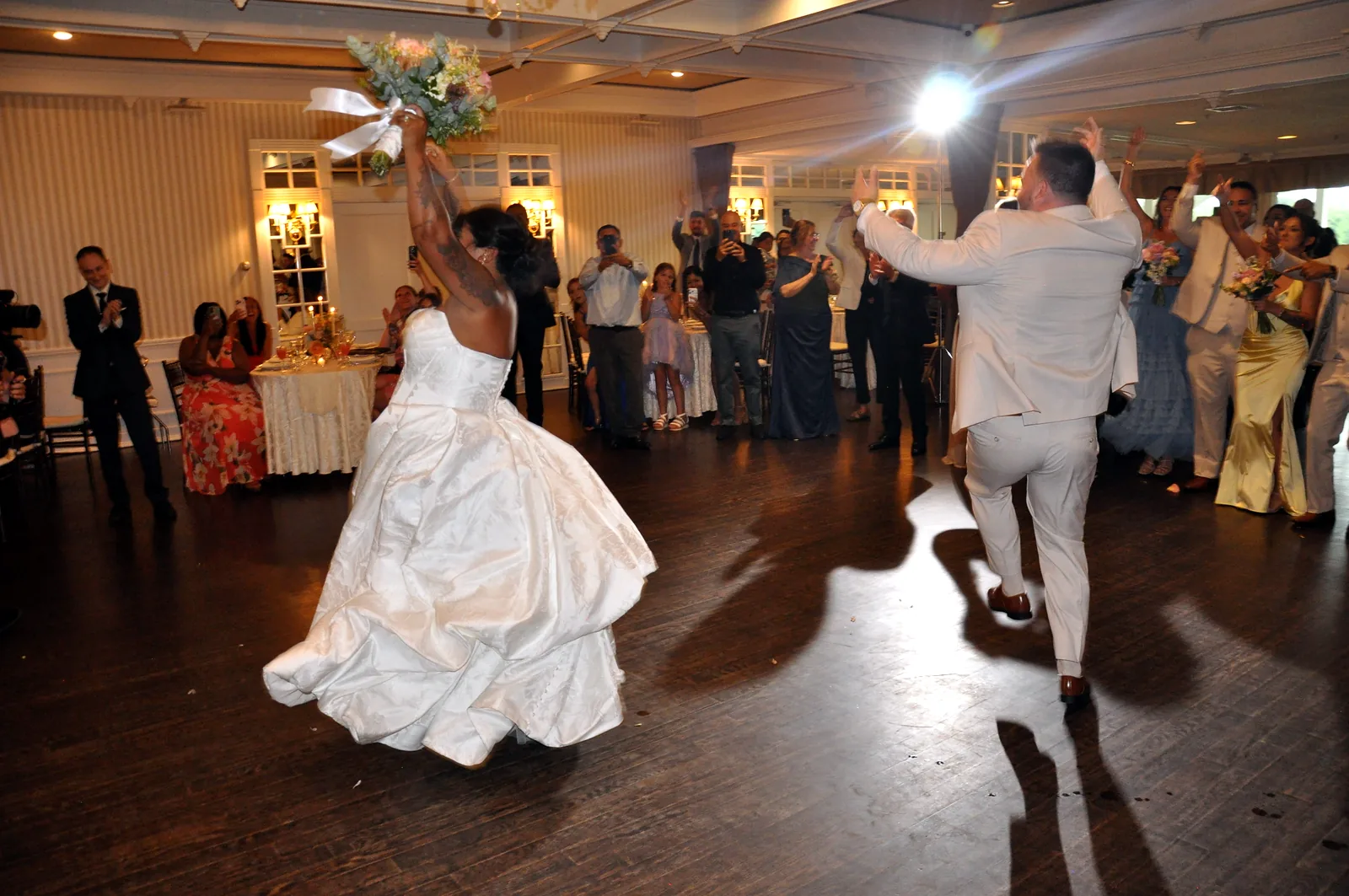 Bride twirling during the grand entrance